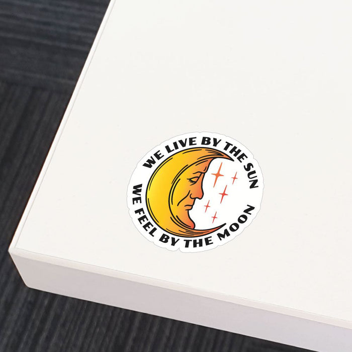 We Live By The Sun We Feel By The Moon Sticker Decal